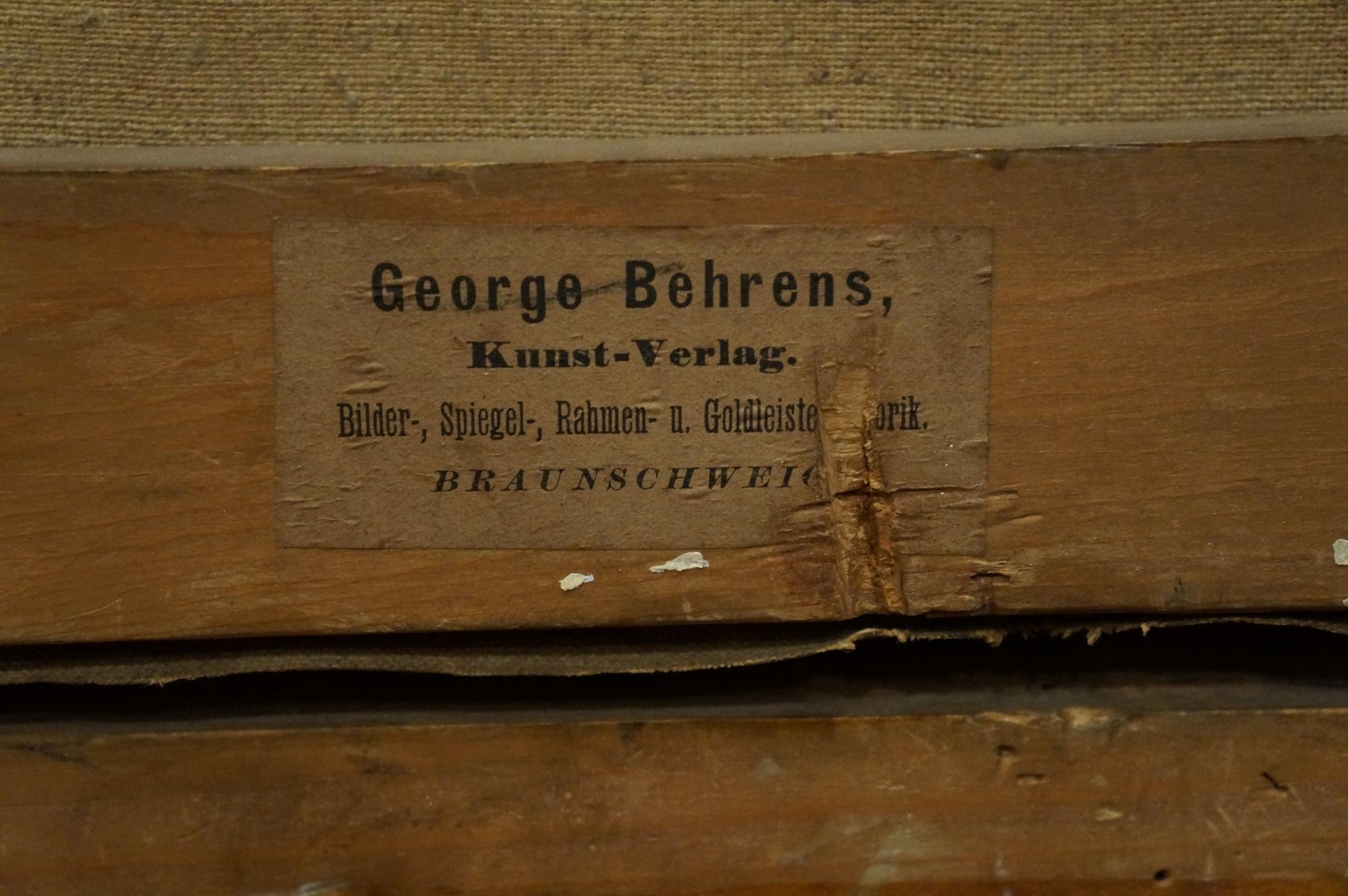 Back of Oil painting Water Mill George Behrens with weathered wooden label