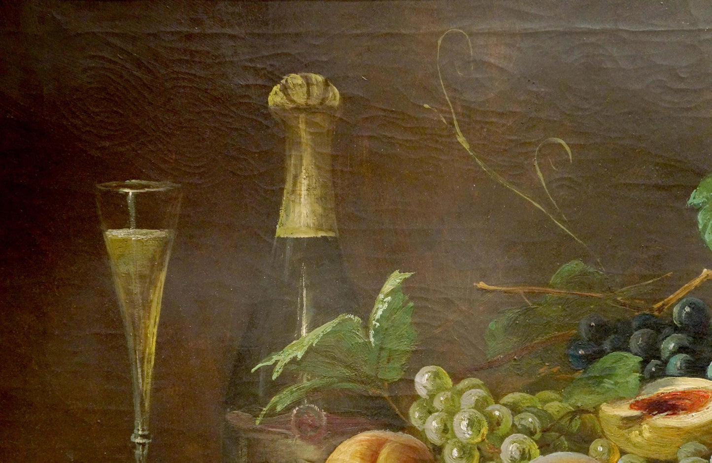 Dark green wine bottle with gold foil neck beside champagne flute in Schlieden M oil painting