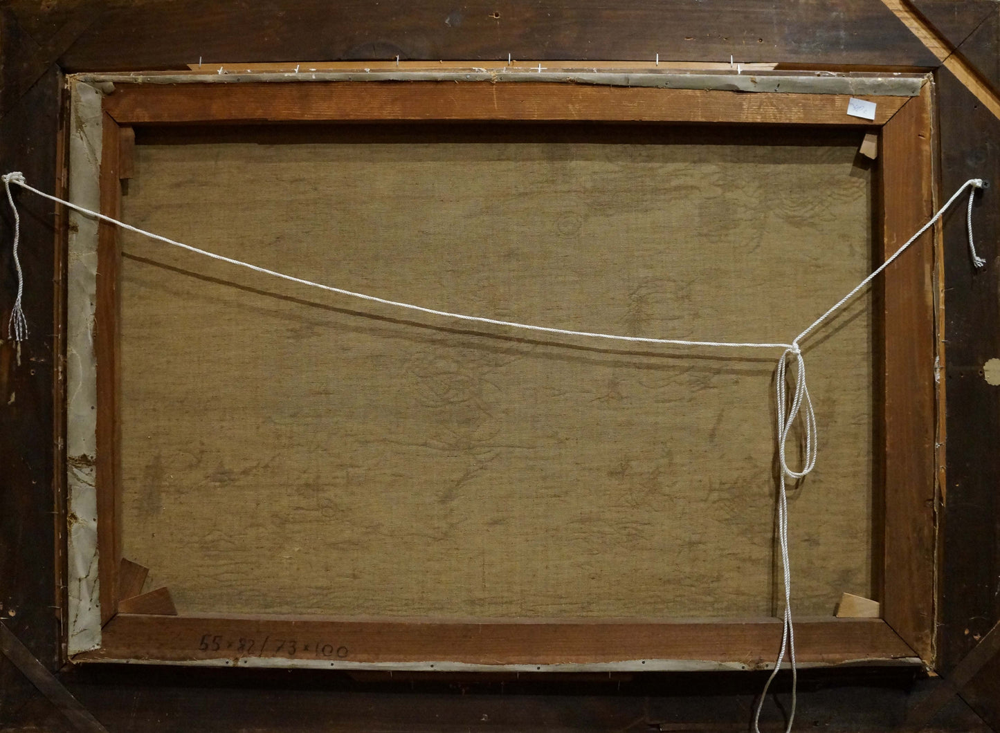 Back of wooden picture frame with light brown finish, white rope, Oil painting Fruit on the table Schlieden M