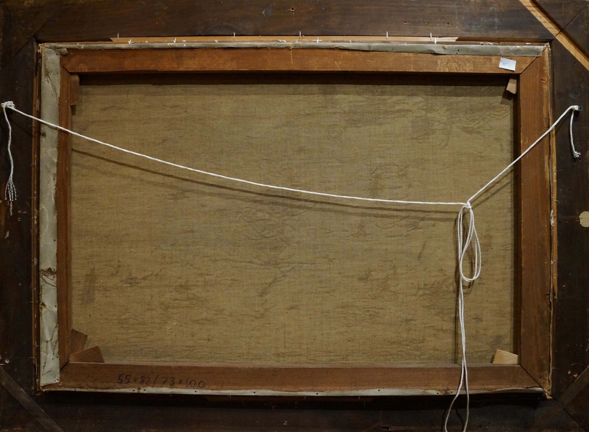 Back of wooden picture frame with light brown finish, white rope, Oil painting Fruit on the table Schlieden M