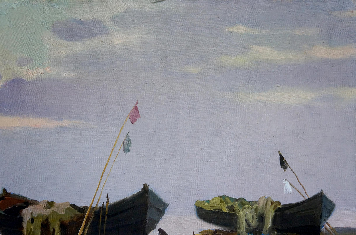 Oil painting by Stepan Kalinovich: two dark boats with fishing gear under cloudy sky