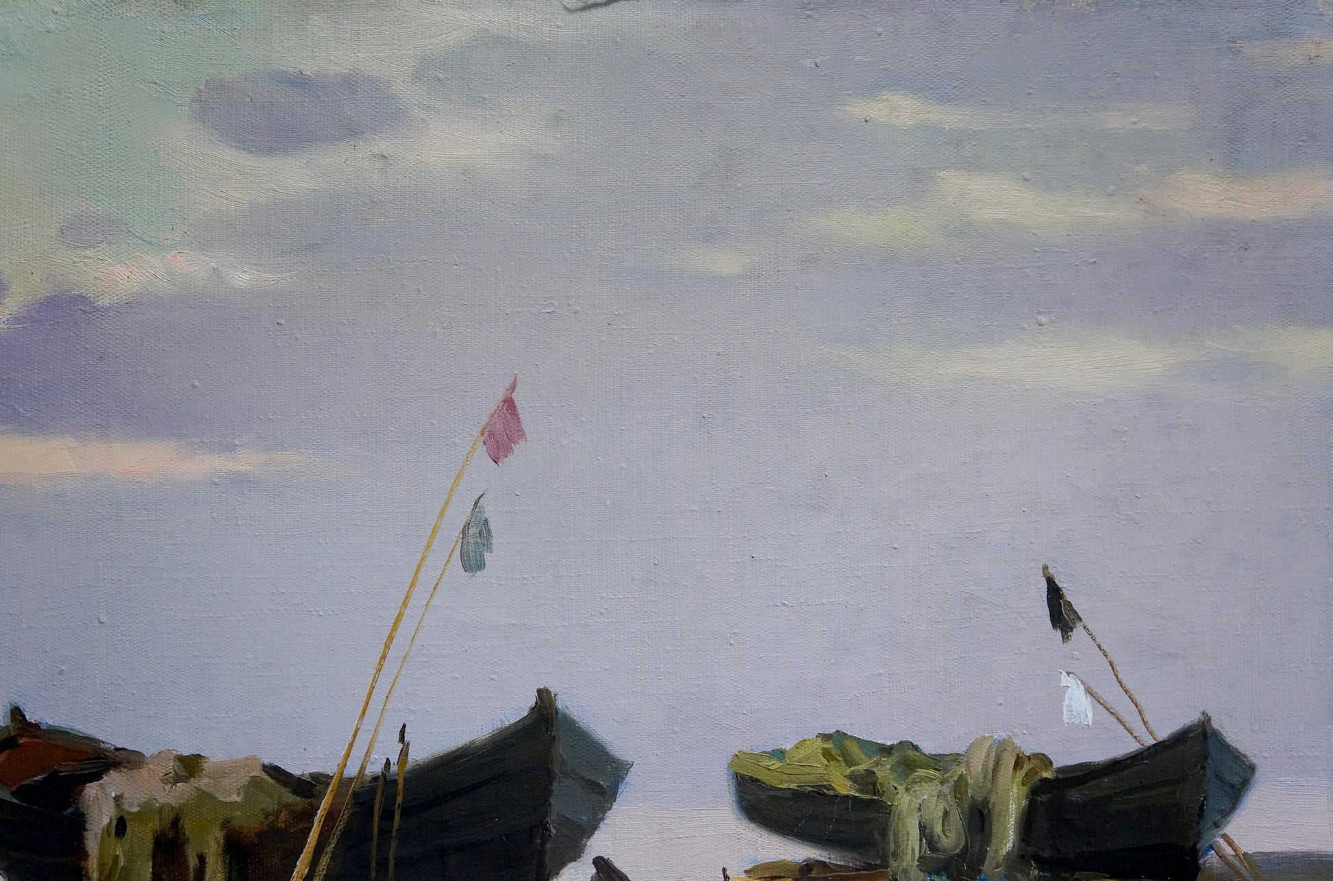 Oil painting by Stepan Kalinovich: two dark boats with fishing gear under cloudy sky