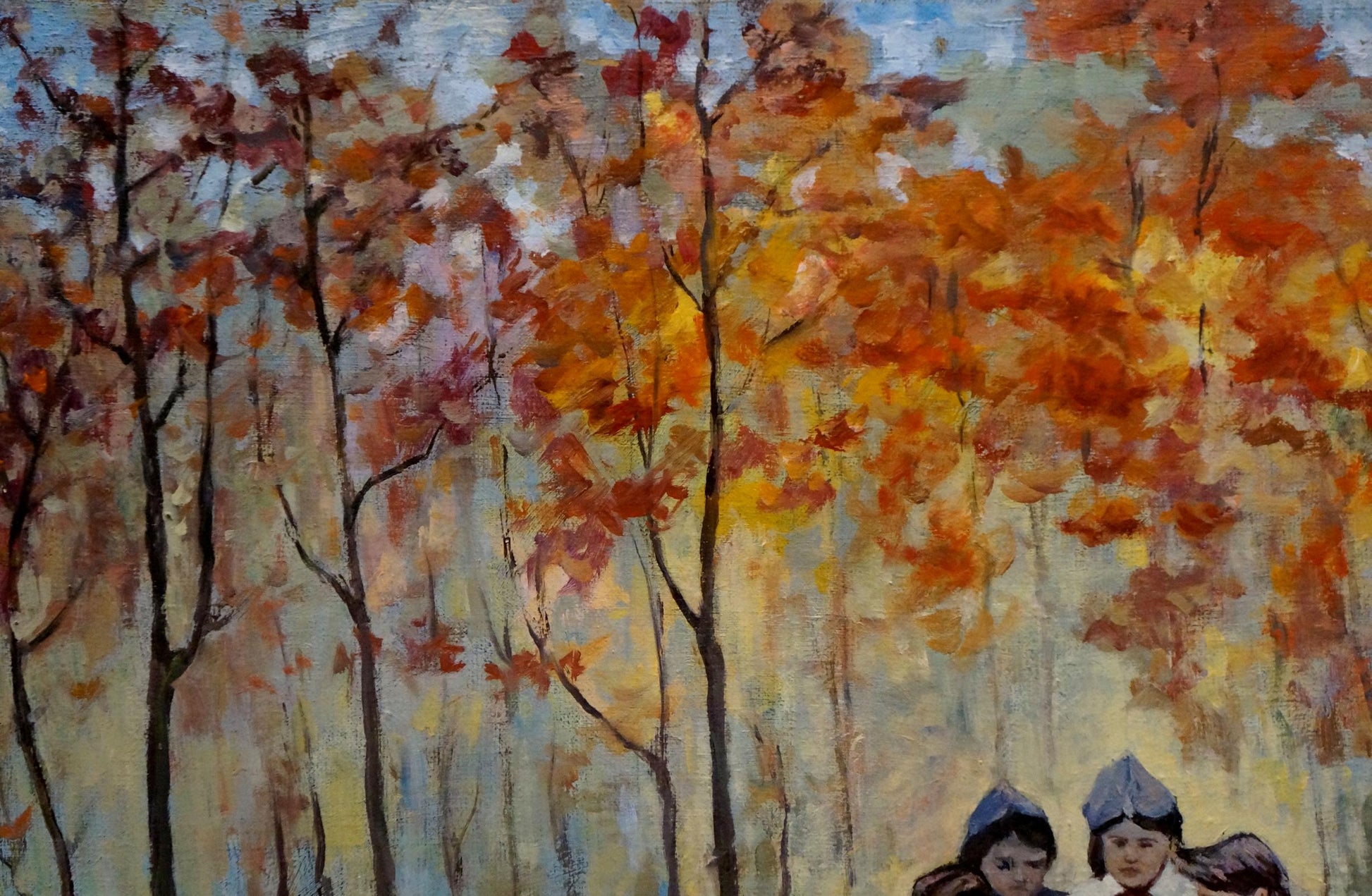 Oil painting In the park: autumn trees with vibrant orange and red leaves against soft sky