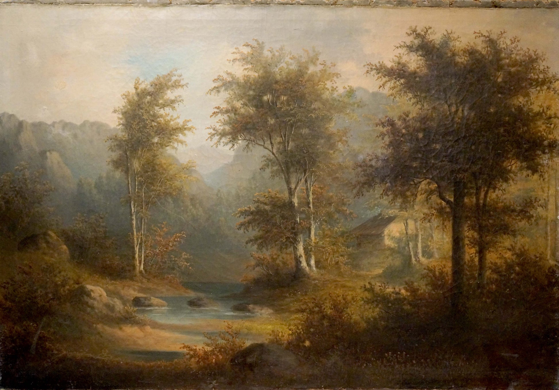 Serene oil painting of house in forest with river, autumn trees, mountains