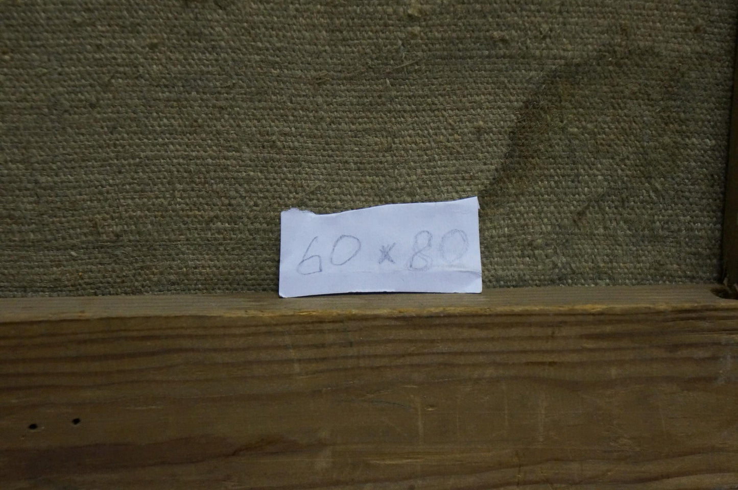 Back of Oil painting Portrait of a schoolboy with 60 x 80 label on wood