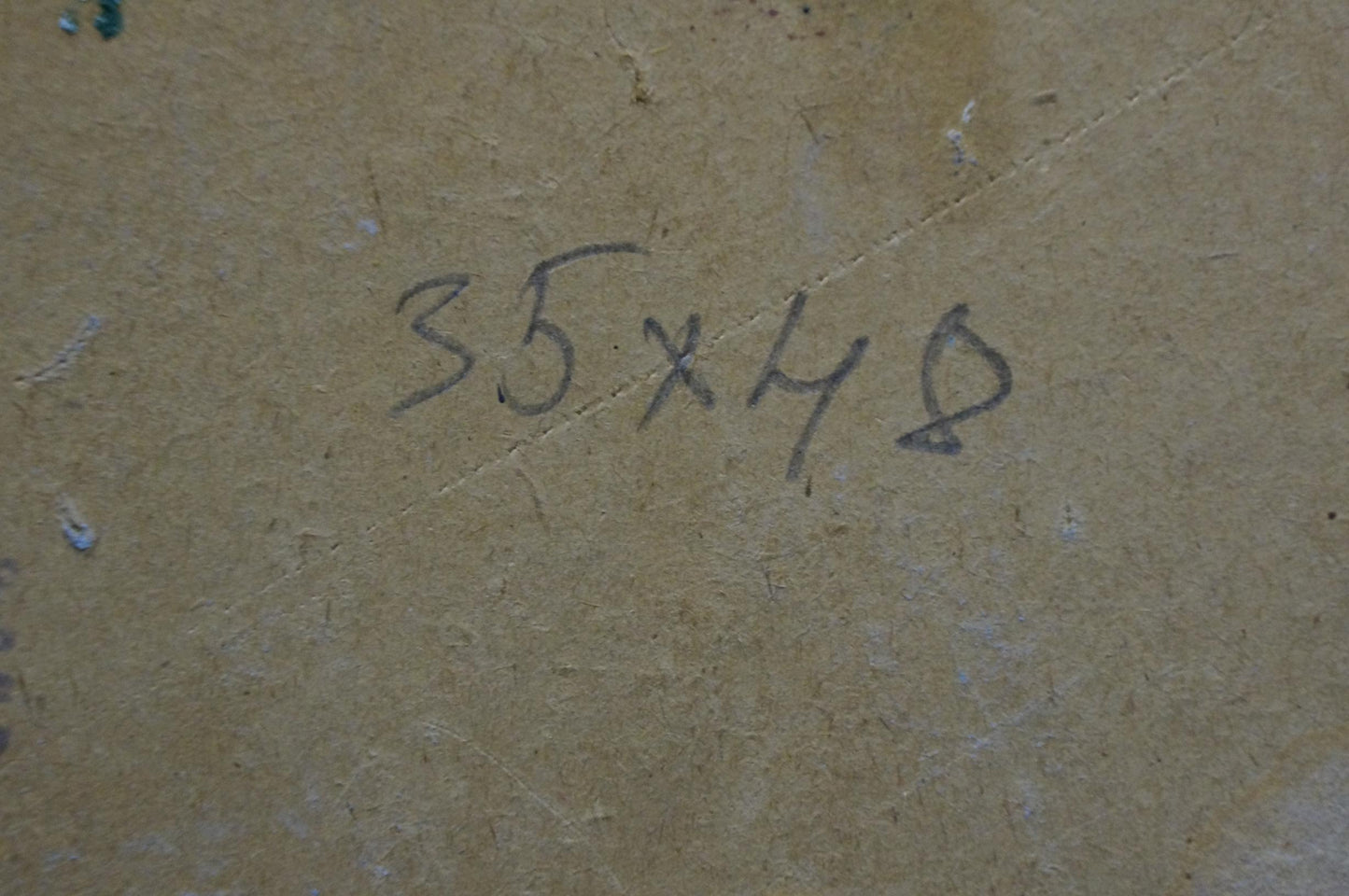 Back of Deineka oil painting with handwritten 35x48in on beige cardboard