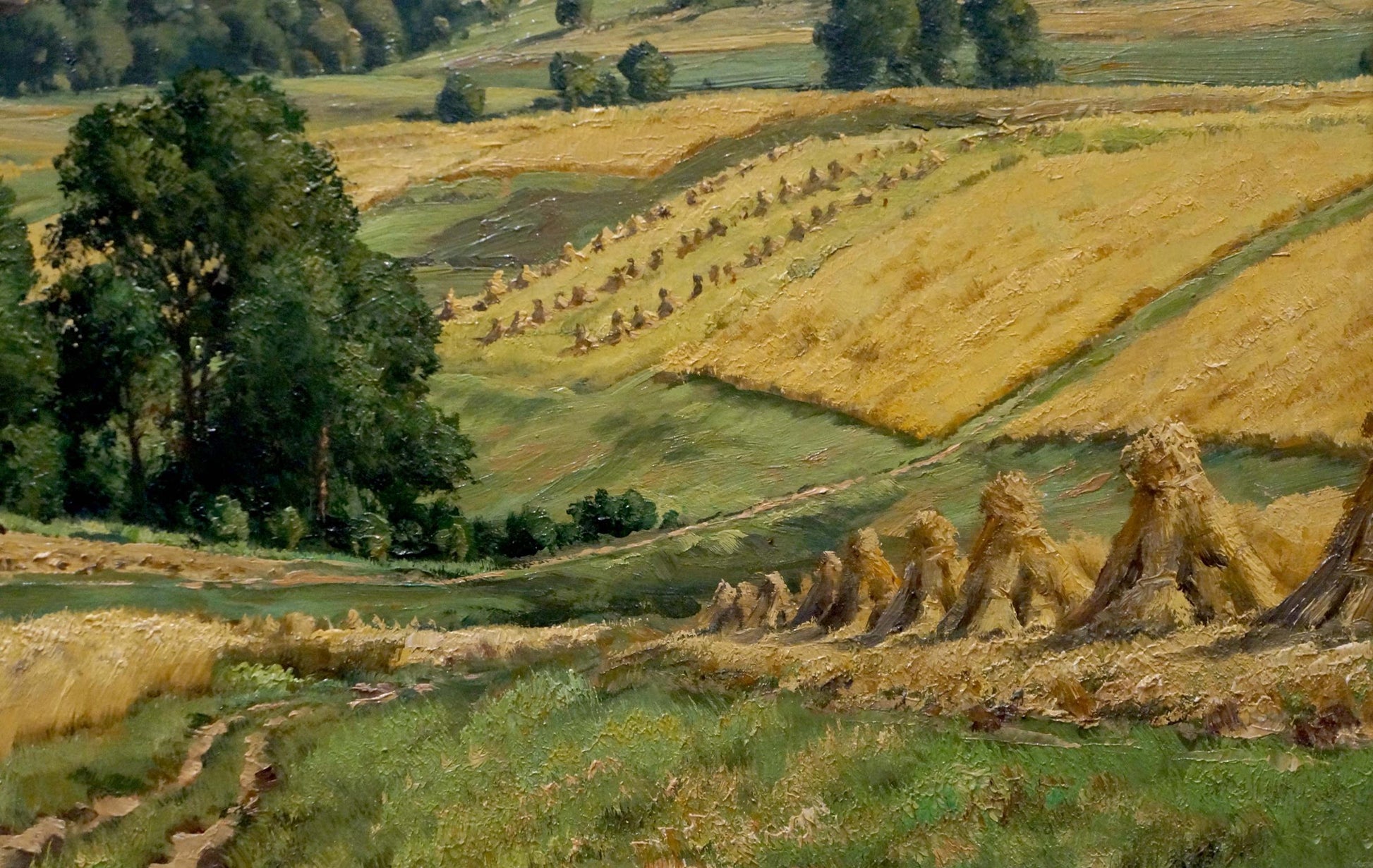 Oil painting landscape with golden hay bales in sunlit field