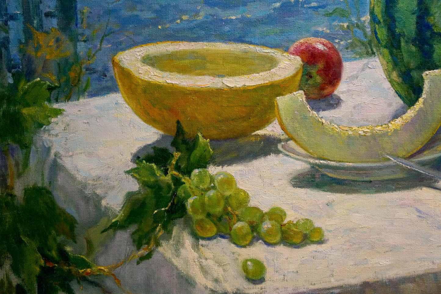 Oil painting by August Gavdzinskaya Elena Albinovna: half-cut yellow melon with grapes and apple