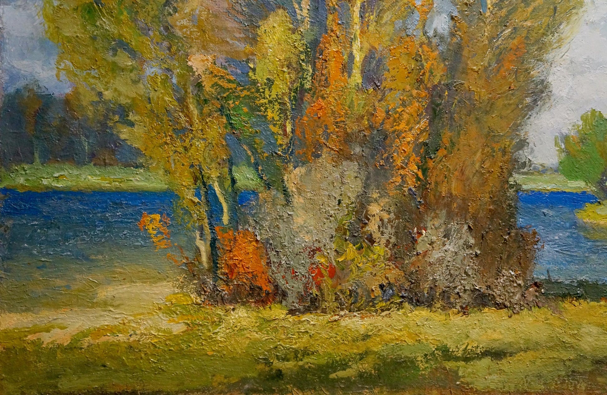 Oil painting Autumn beauty by Mynka Alexander Fedorovich, vibrant autumn trees by waterway