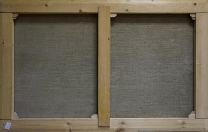 Back of light wood stretcher frame with gray canvas panels for Babynets mountain oil painting
