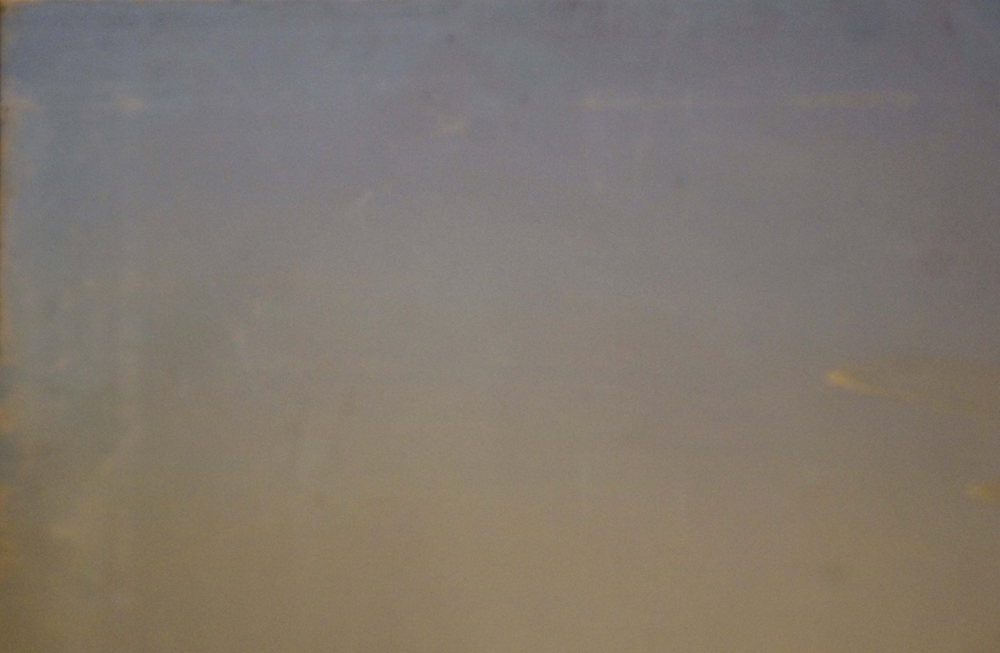 Blurry abstract oil painting of people by the lake in gray beige tones