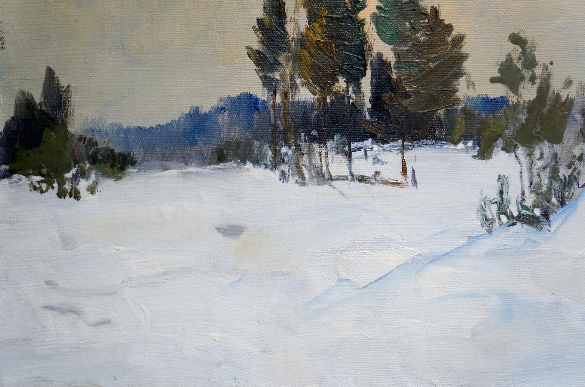 Large oil painting of snowy forest drifts with textured evergreen trees