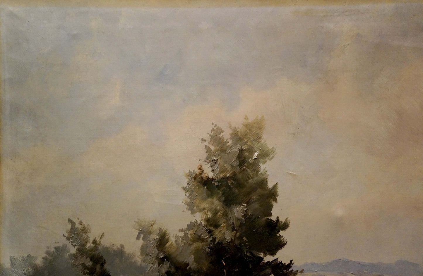 Quiet calm day oil painting of solitary evergreen tree in hazy sky