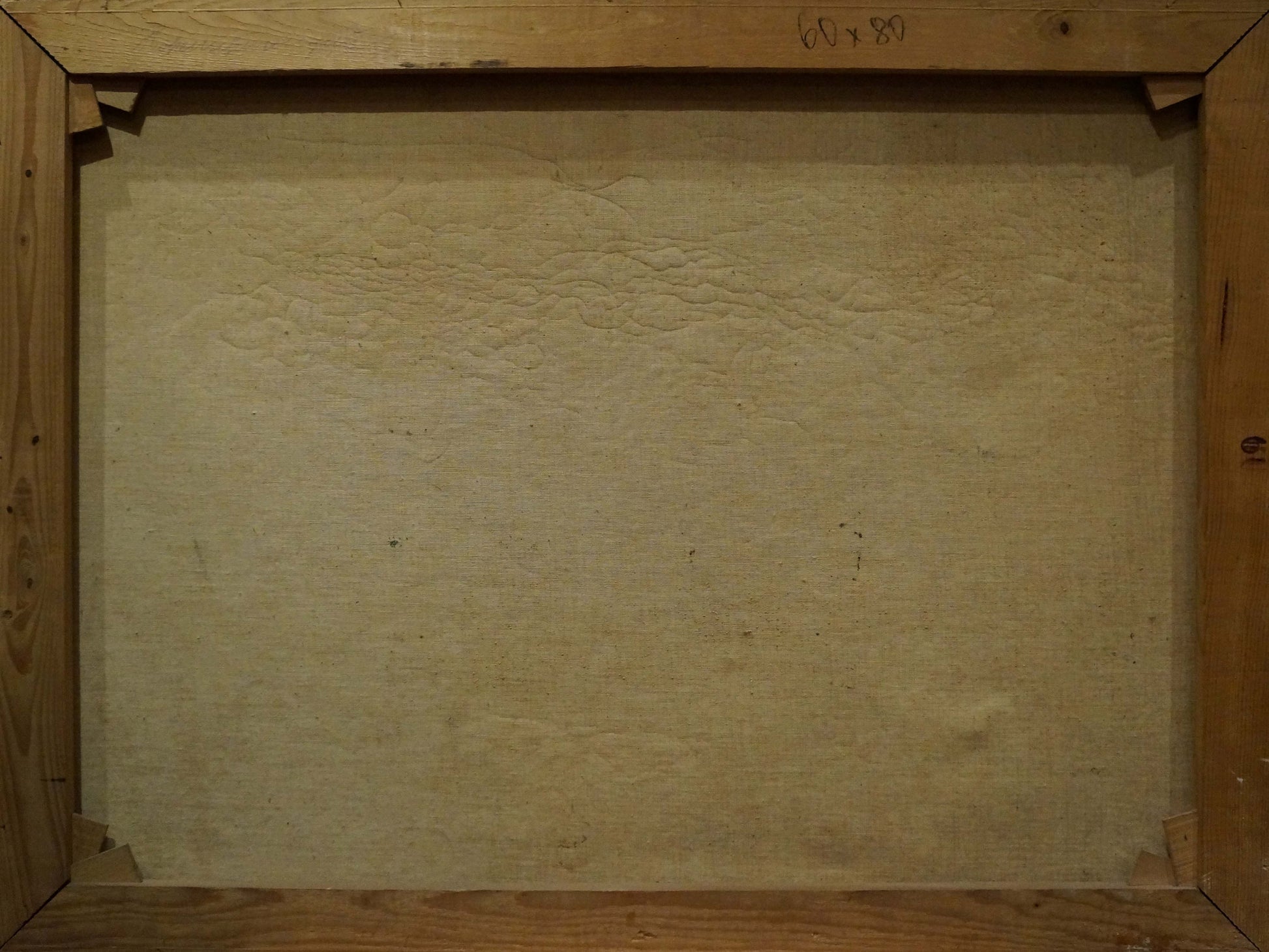Back of wooden-framed Oil painting Castle landscape canvas with staples