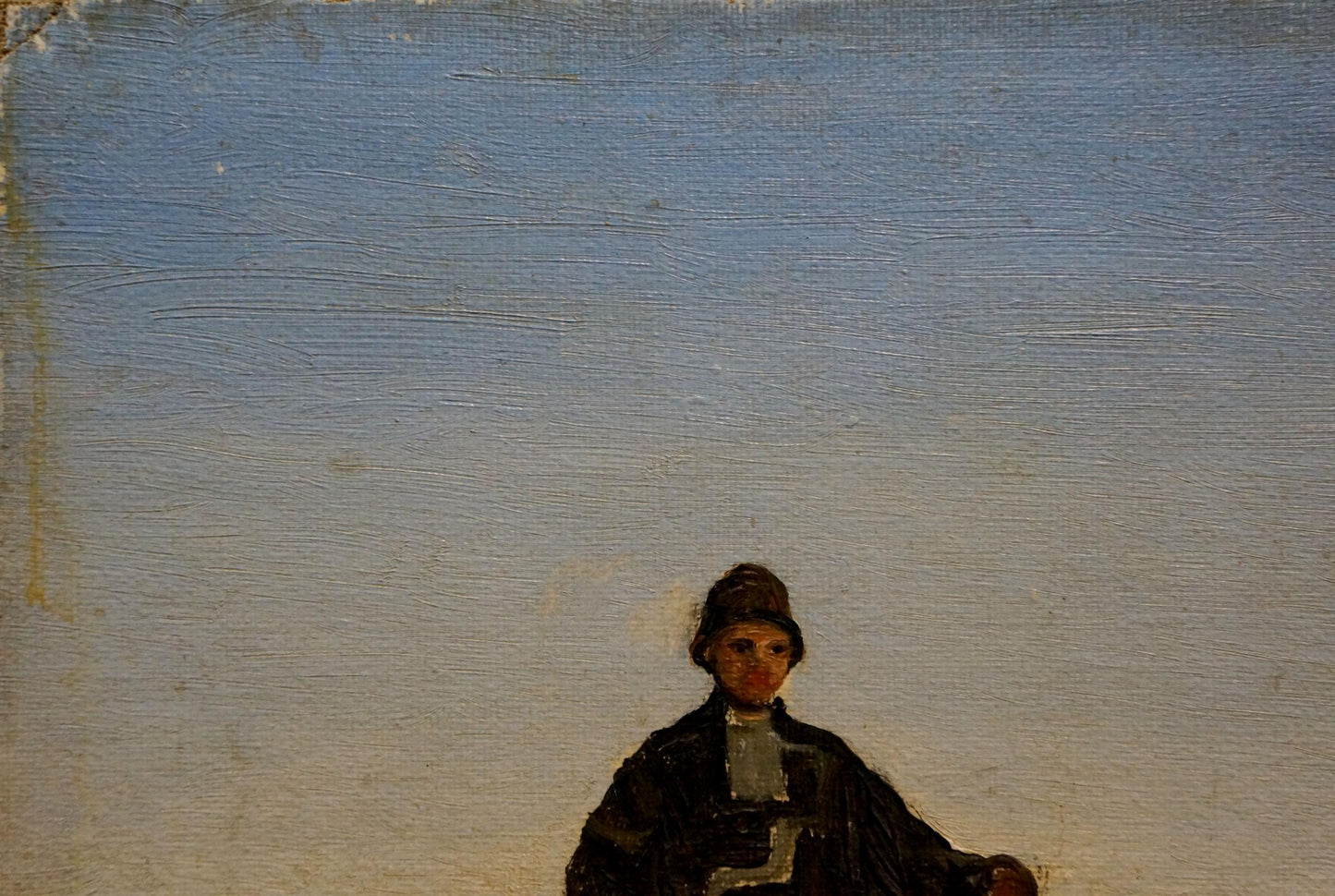 Oil painting of man on horse in dark attire and hat against muted blue sky