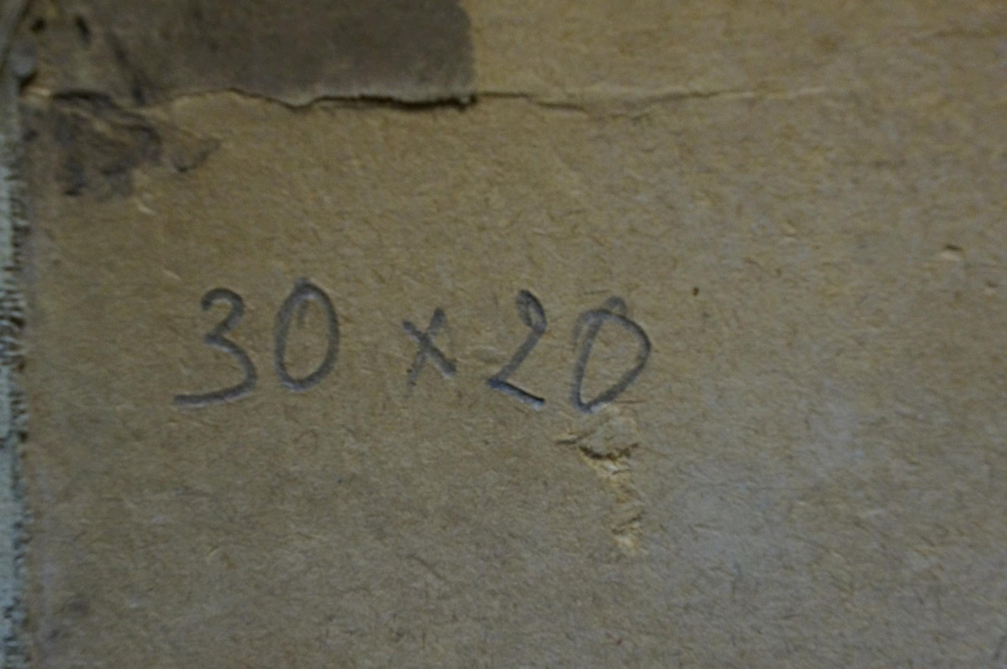 Back of Oil painting Man on horse with handwritten 30 x 20 in on beige concrete