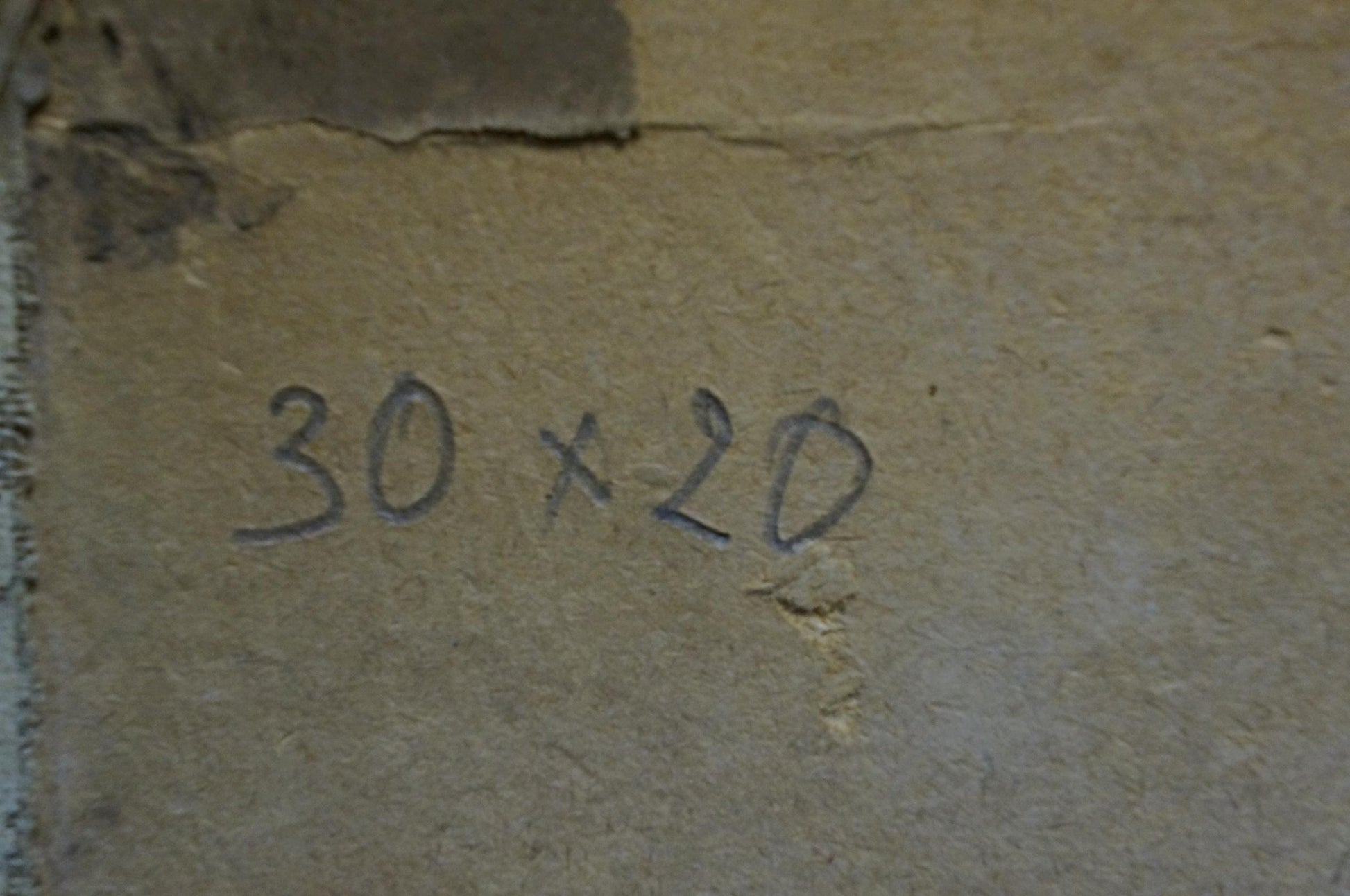 Back of Oil painting Man on horse with handwritten 30 x 20 in on beige concrete