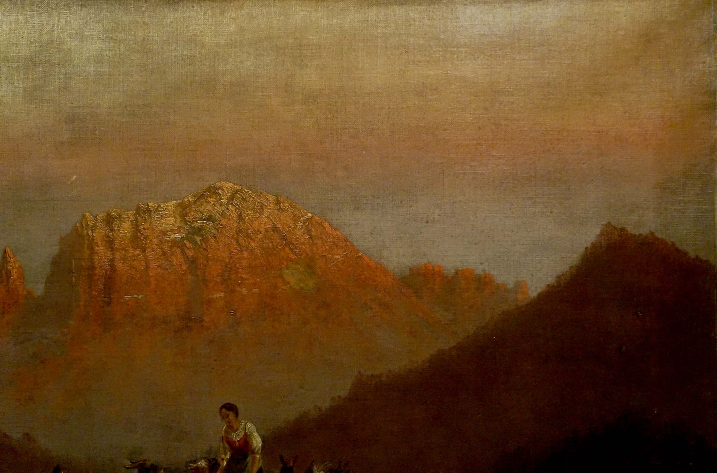 Oil painting of walking goats in rugged mountains bathed in golden light