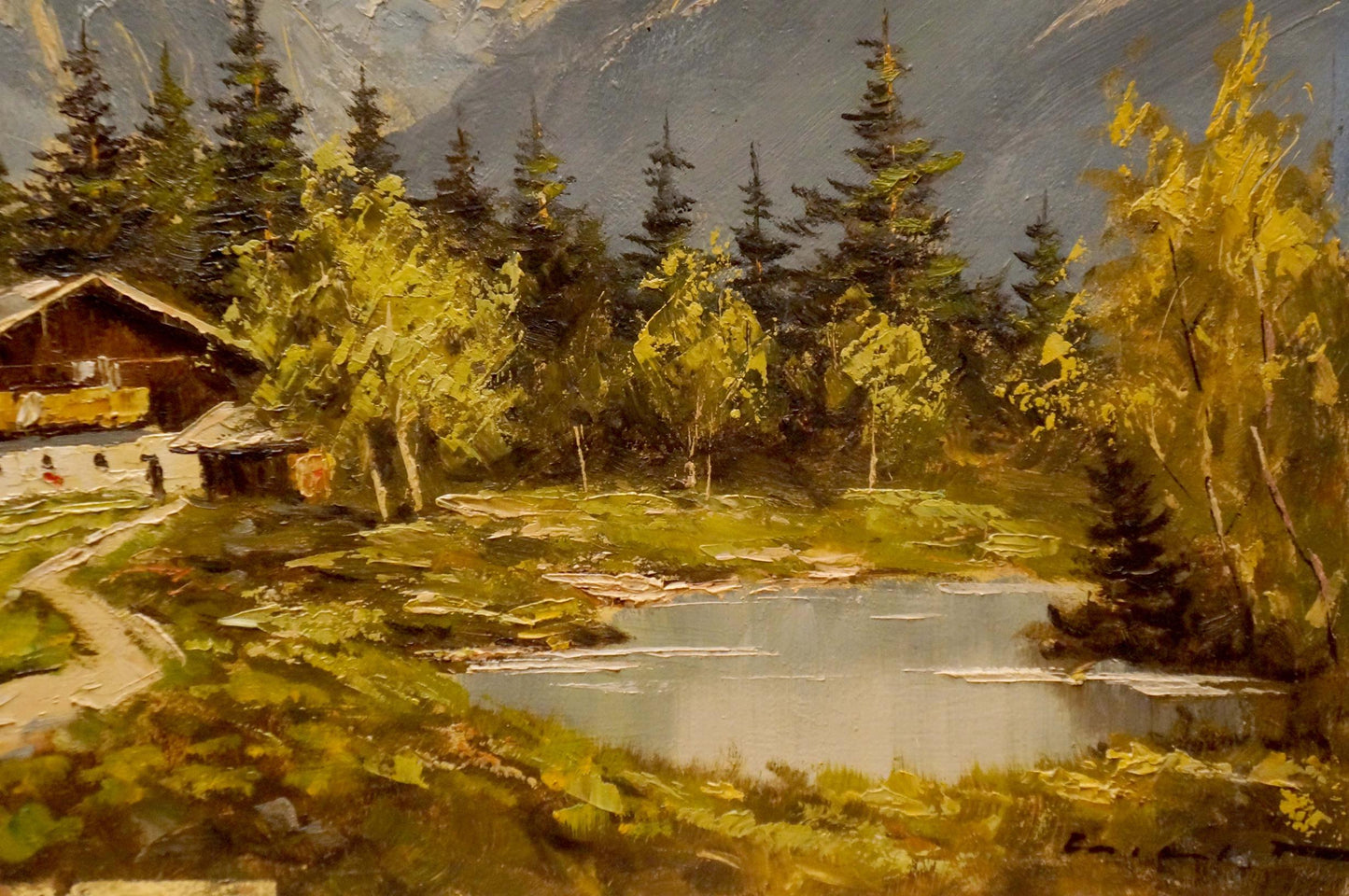 Oil painting of rustic mountain house mill by lake amid green yellow trees