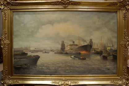 Ornate gold-framed oil painting of bustling harbor with ships under overcast sky