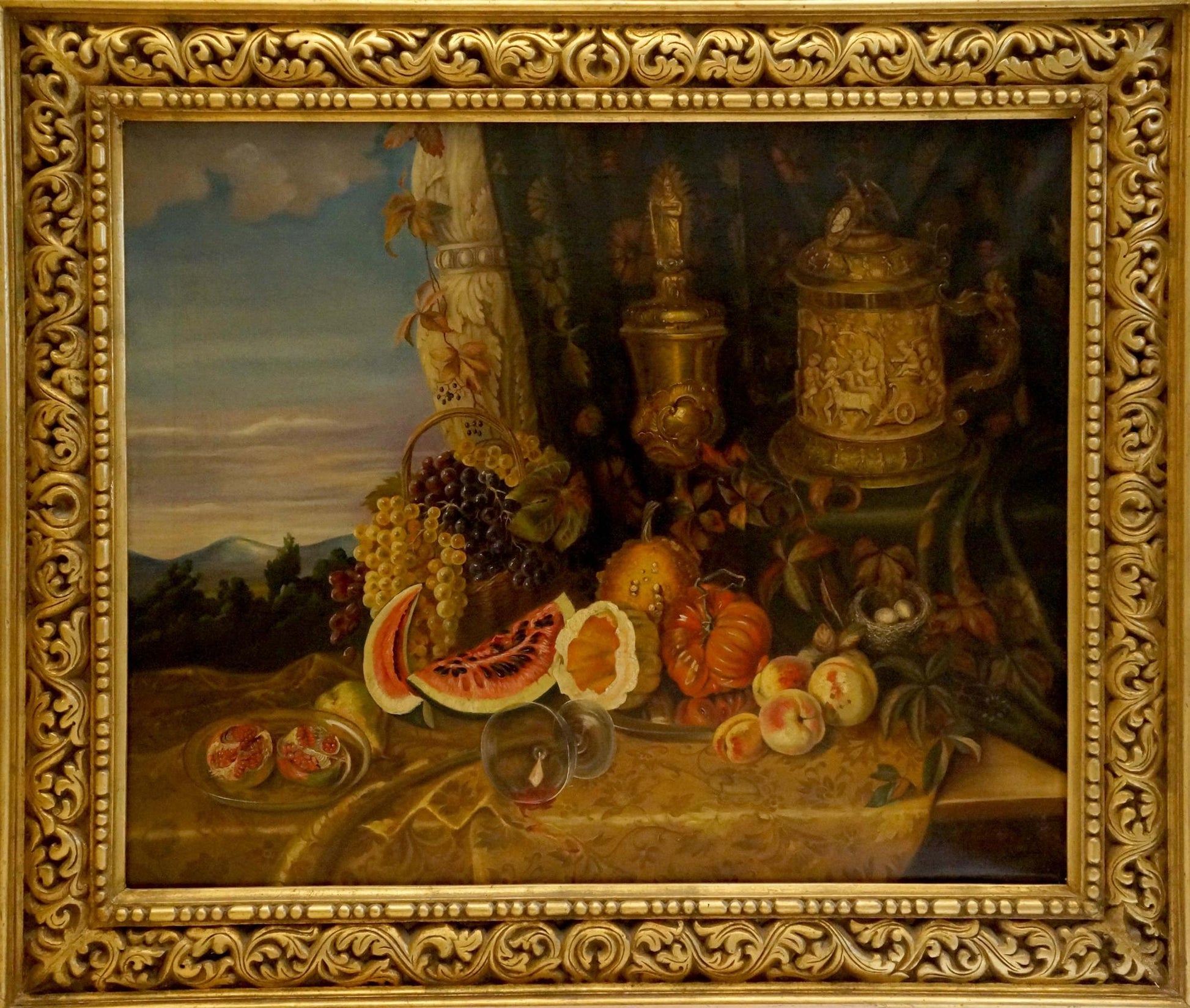 Ornate gold-framed oil painting of still life with fruit and vegetables