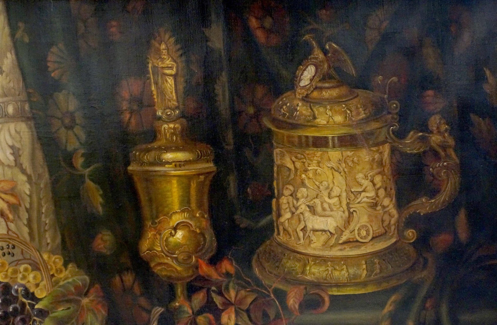 Golden ornate beer stein with eagle-topped lid in oil painting still life