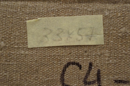 Back of Nikolay Vladimirovich Chernikov winter oil painting with beige textured fabric and torn label