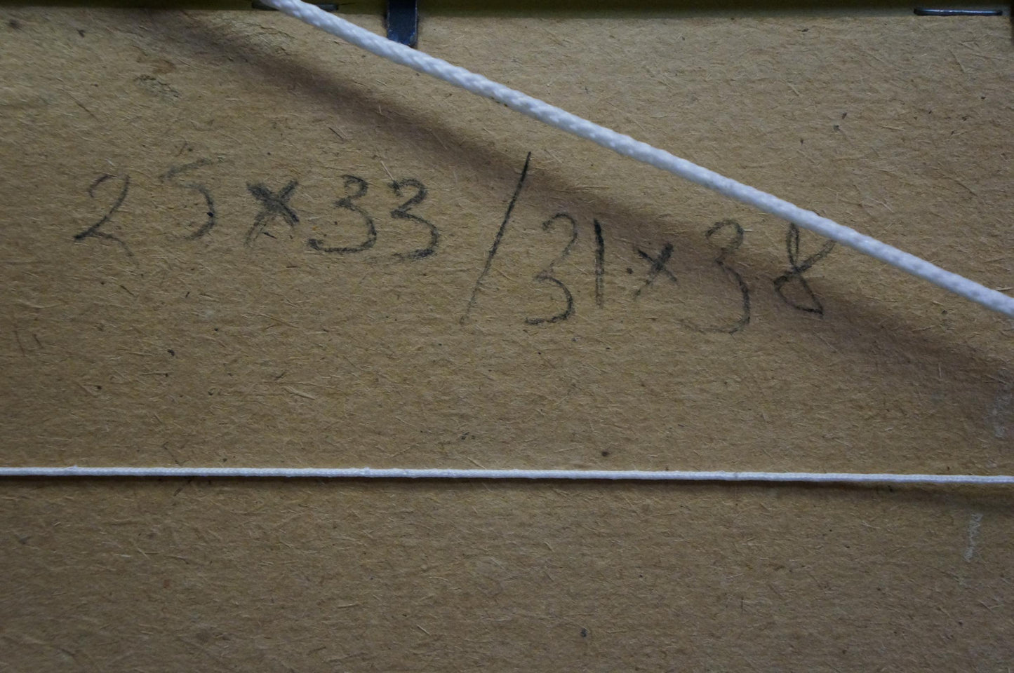 Back of Oil painting At the house on the outskirts with handwritten measurements on brown cardboard