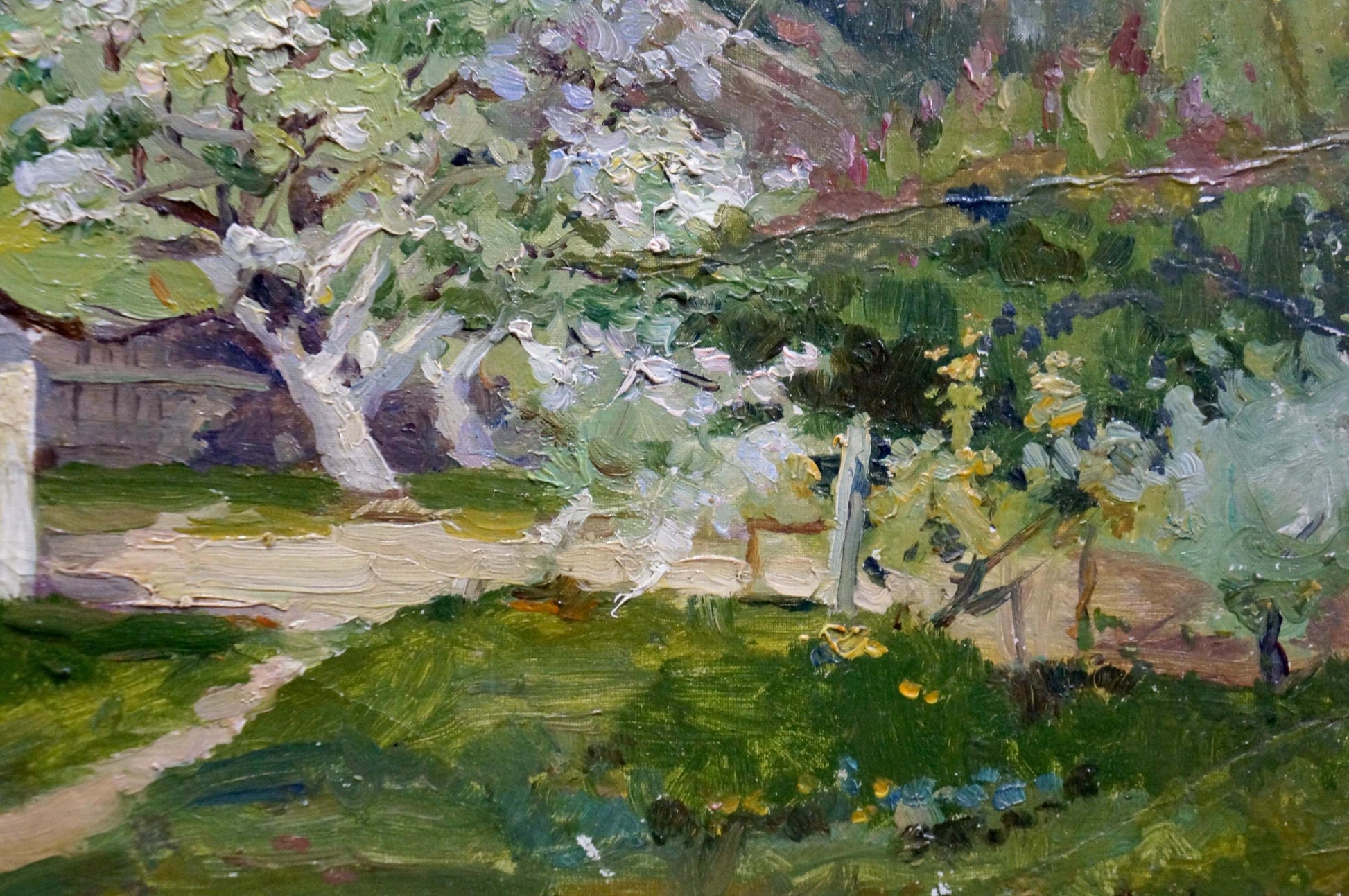 Vibrant impressionist oil painting of blossoming tree in the village