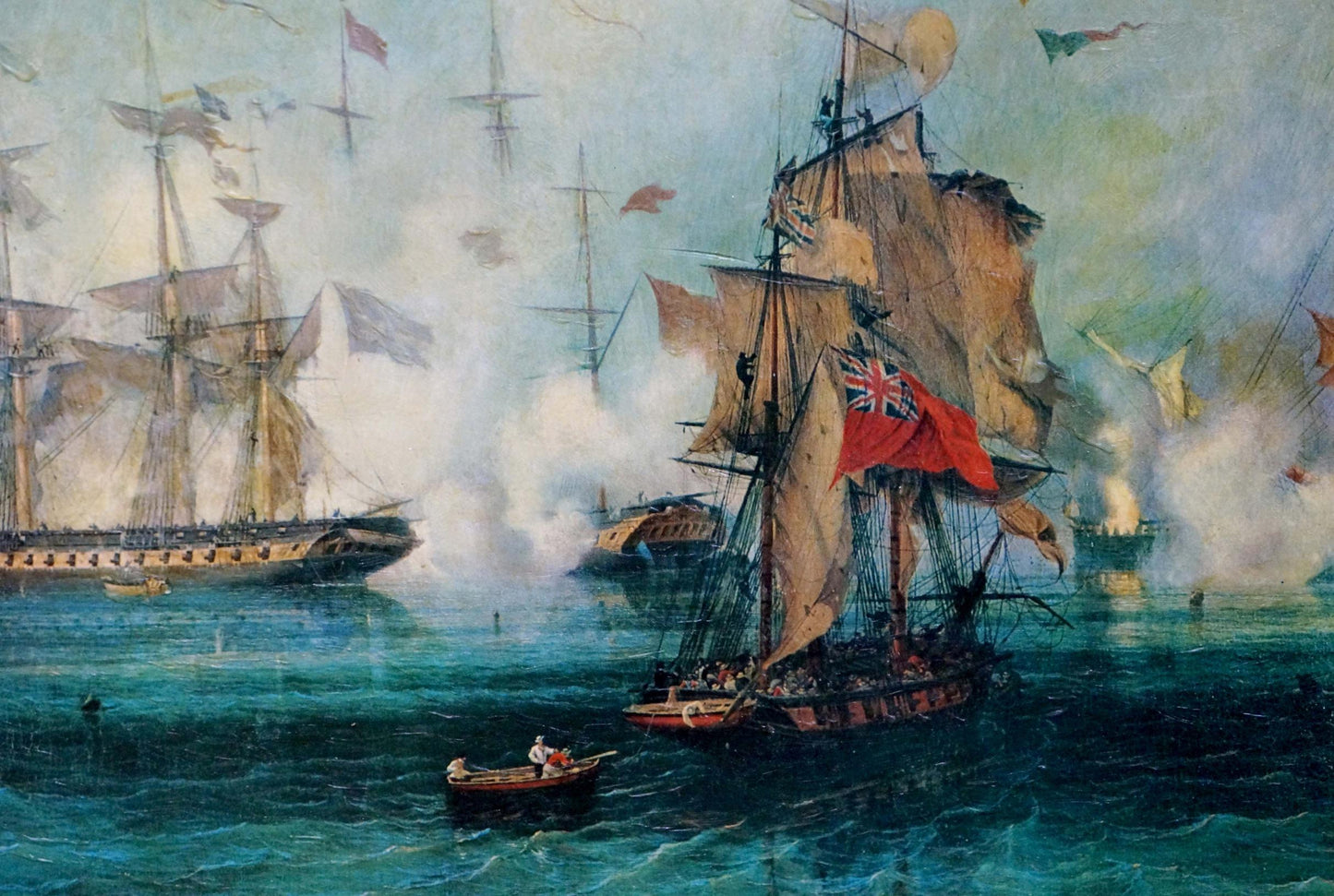 Oil painting of British warship with red ensign in naval battle at sea