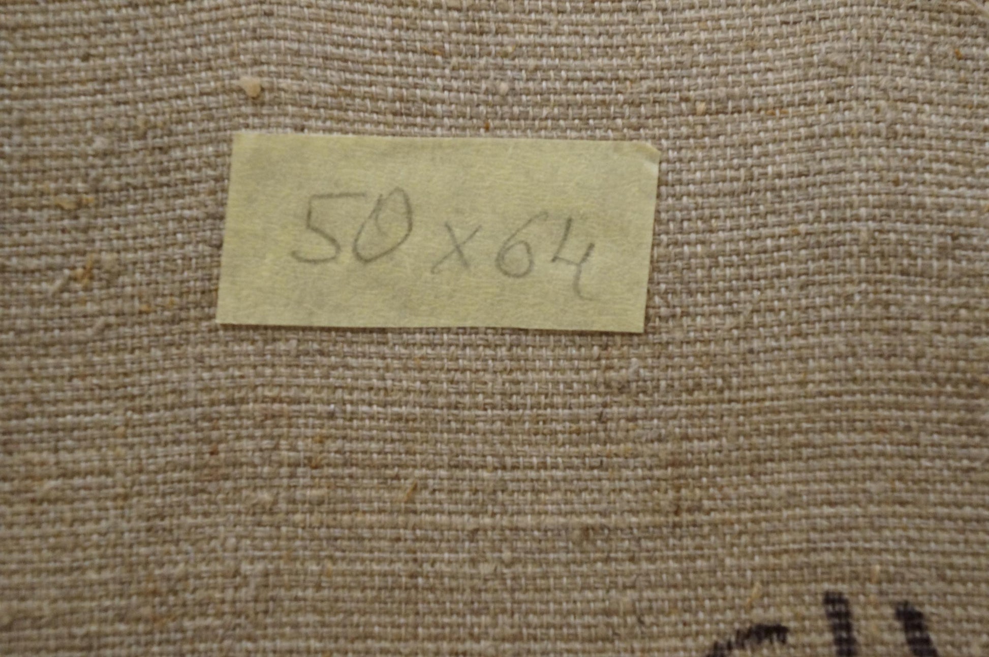 Back of Oil painting Outdoors Chernikov Nikolay Vladimirovich with beige handwritten label on textured fabric