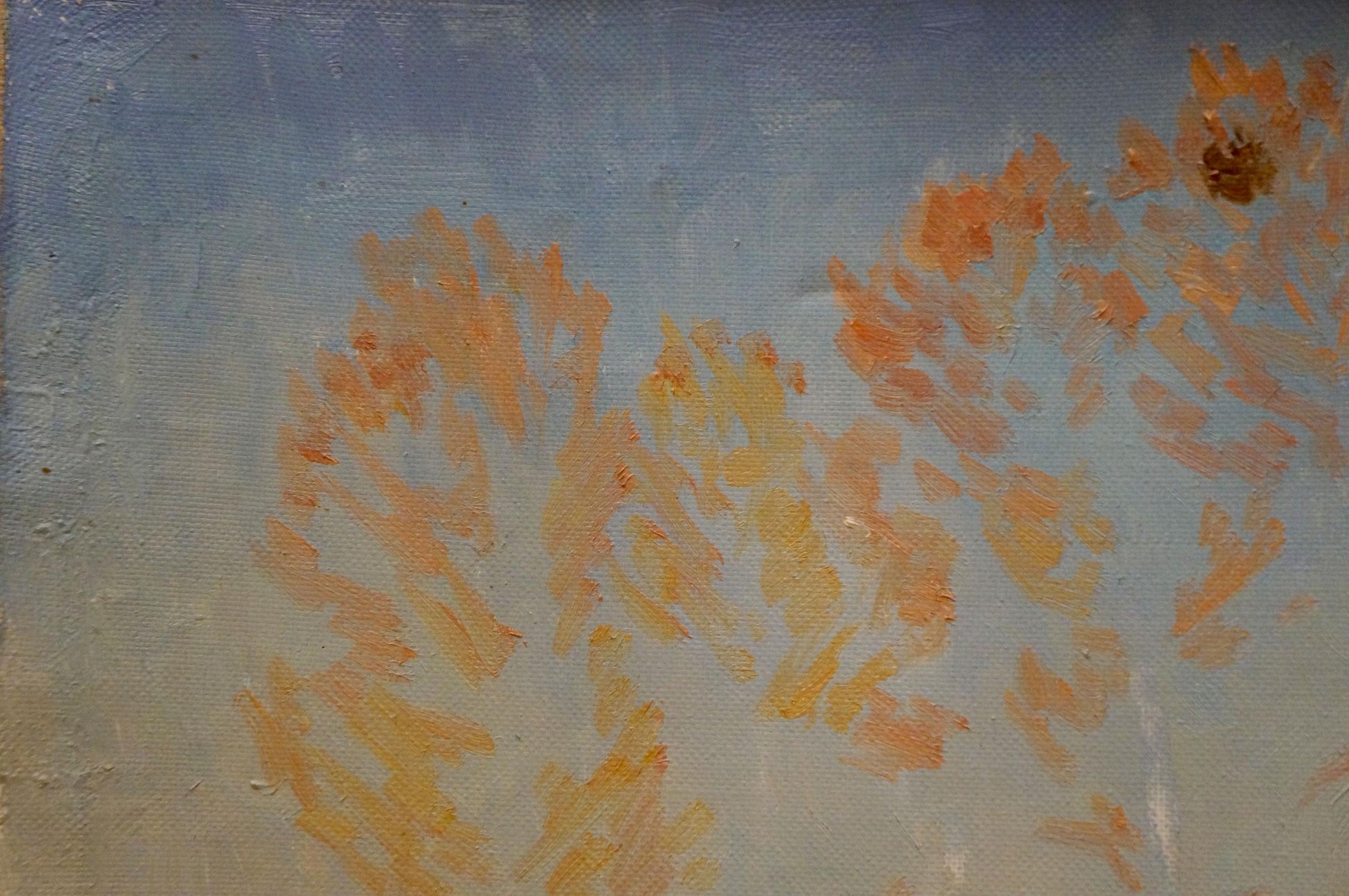 Abstract oil painting featuring textured brushstrokes of orange and yellow against a muted blue-gray canvas.