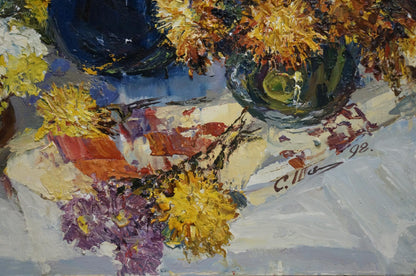 Oil painting of vibrant yellow purple summer flowers in blue vase by Sergey Shapovalov