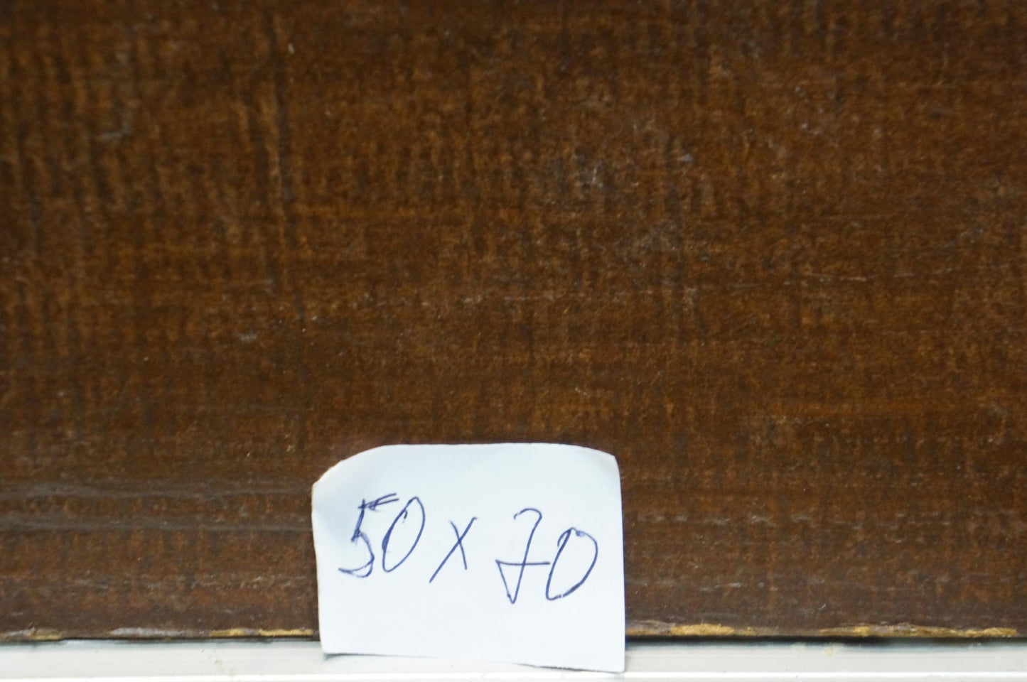 Back of Oil painting Fish soup I. Braz, 50 x 70 label on wood grain