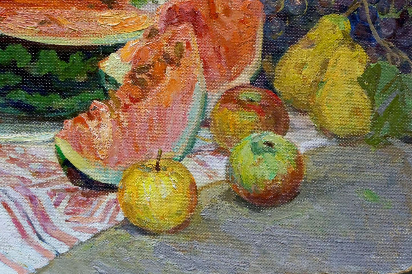 Oil painting still life with sliced watermelon on striped cloth