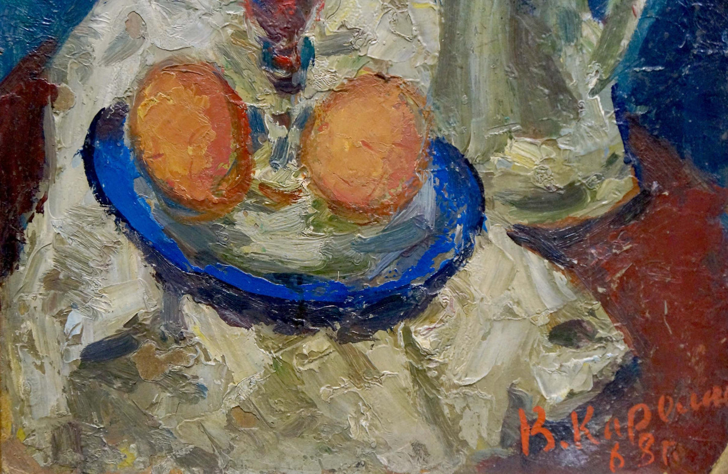 Oil painting Still life Karelin Vyacheslav: vibrant blue bowl with two orange fruits