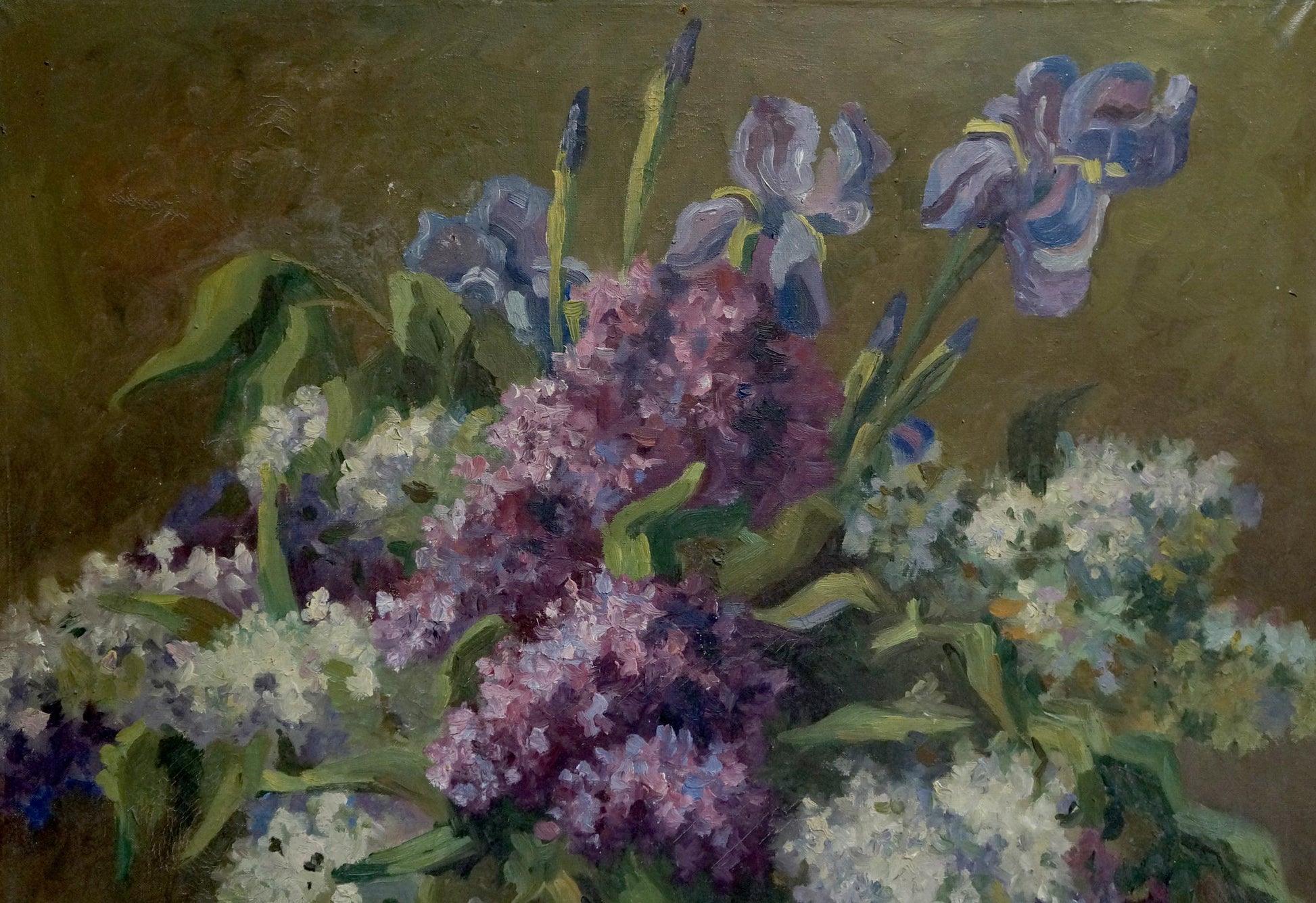 Vibrant oil painting of lilacs and irises decorating table by unknown artist