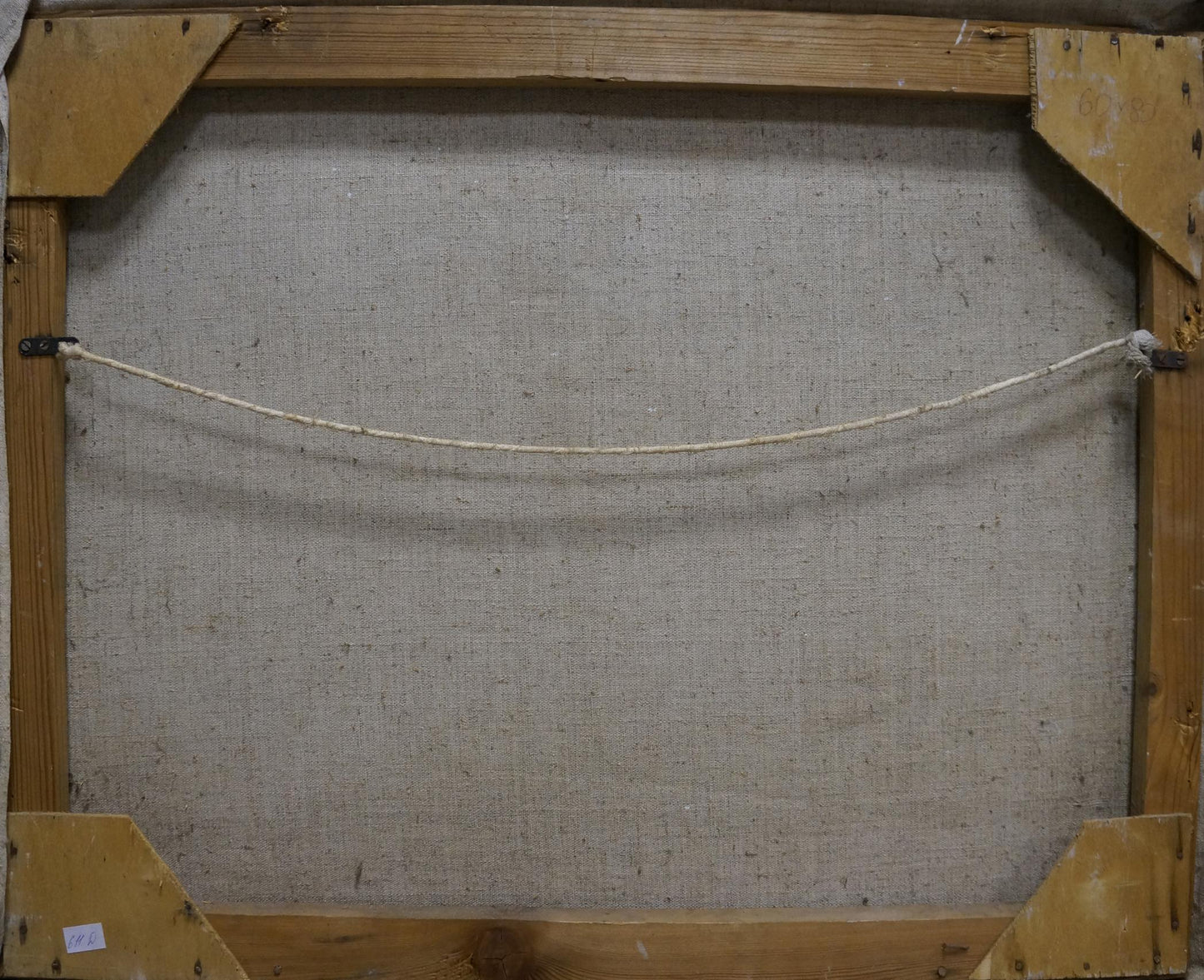 Back of Oil painting Trees are blooming canvas with beige linen and white string