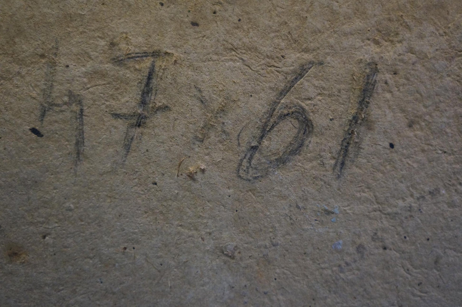 Faded charcoal markings on textured concrete back of Ruban Grigory Savelievich oil painting