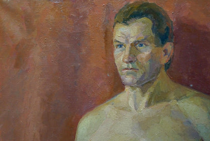 Oil painting of seated man with blue eyes by Maria Titarenko