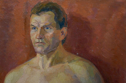 Oil painting of seated man with blue eyes by Maria Titarenko
