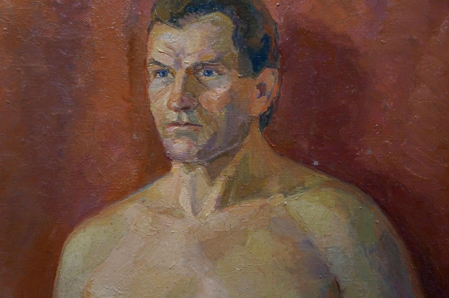 Oil painting seated portrait of shirtless man with blue eyes by Maria Titarenko