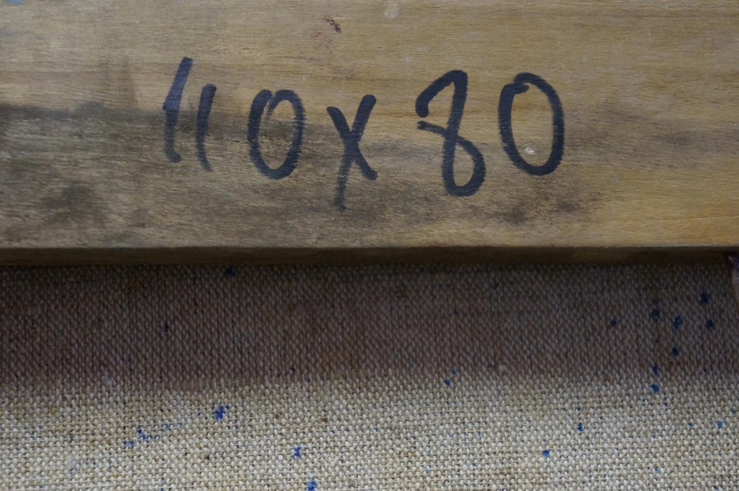 Back of Tytarenko Odarka Anatoliivna oil painting with 110x80 handwritten in black marker on weathered wooden stretcher bar
