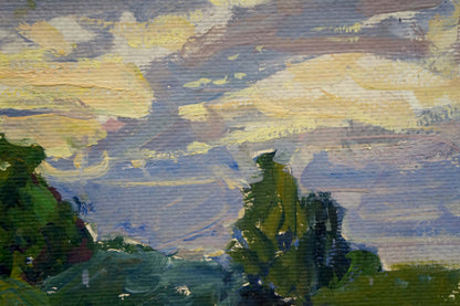 Oil painting At a lake by Fomin Anatoly Nikiforovich with yellow blue clouds and green trees