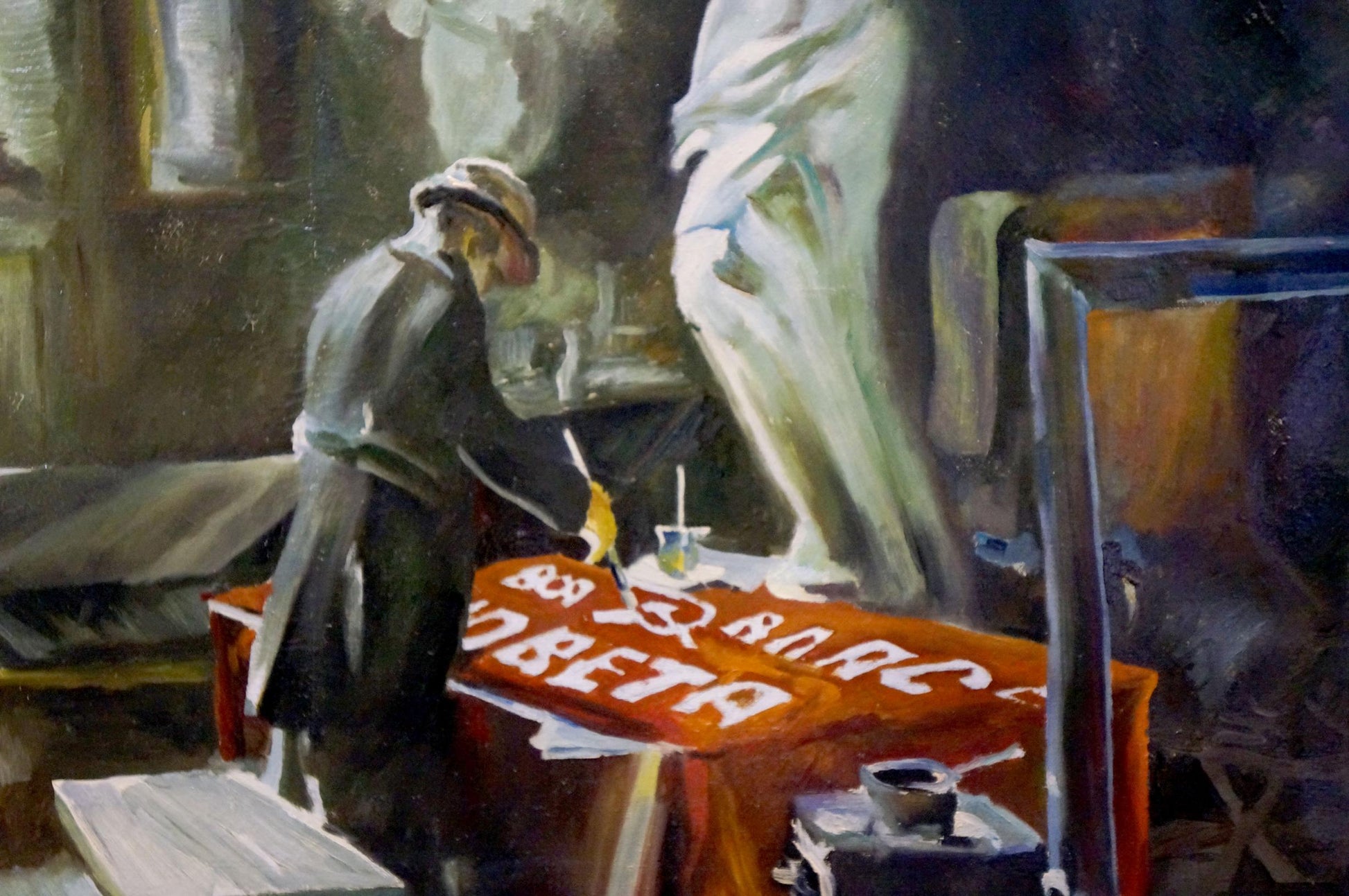 Oil painting The first slogan by Titarenko Maria Anatolyevna: man in dark coat and hat before orange tablecloth with white lettering near draped statue
