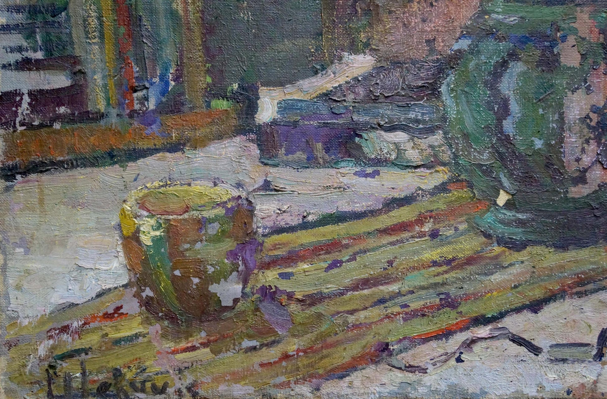 Textured earth-toned ceramic cup by Yuri Dmitrievich Shevchik on painted surface