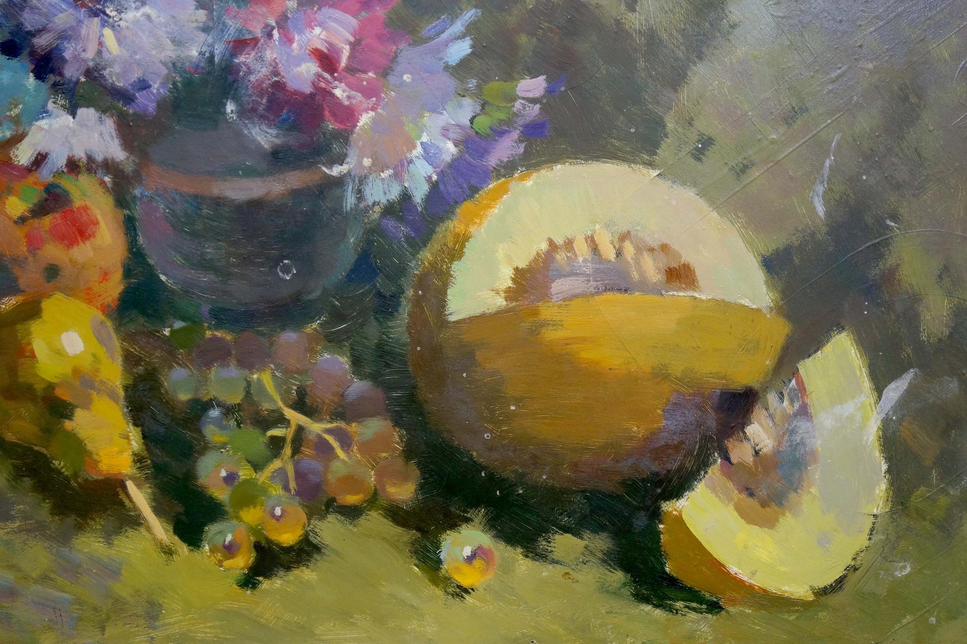 Oil painting still life with sliced cantaloupe and grapes by unknown artist
