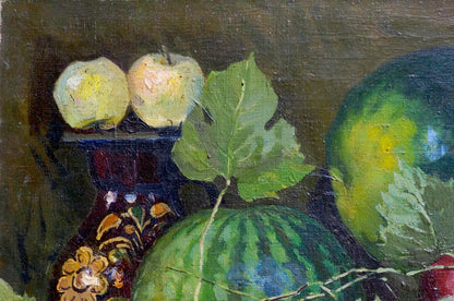 Oil painting of dark red vase with gold floral patterns holding pale green apples