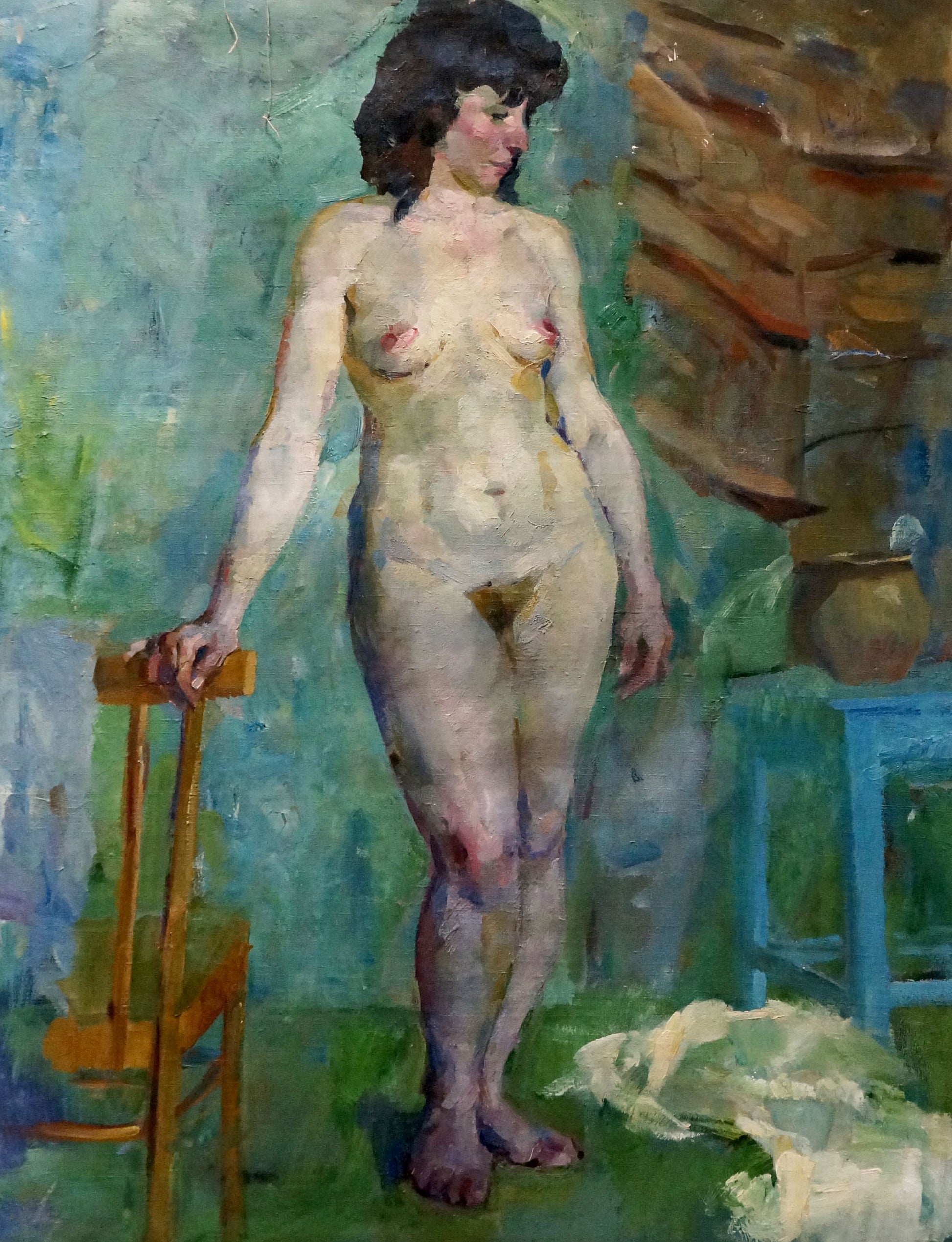 Oil painting of figure Maria Titarenko by orange chair, impressionist style