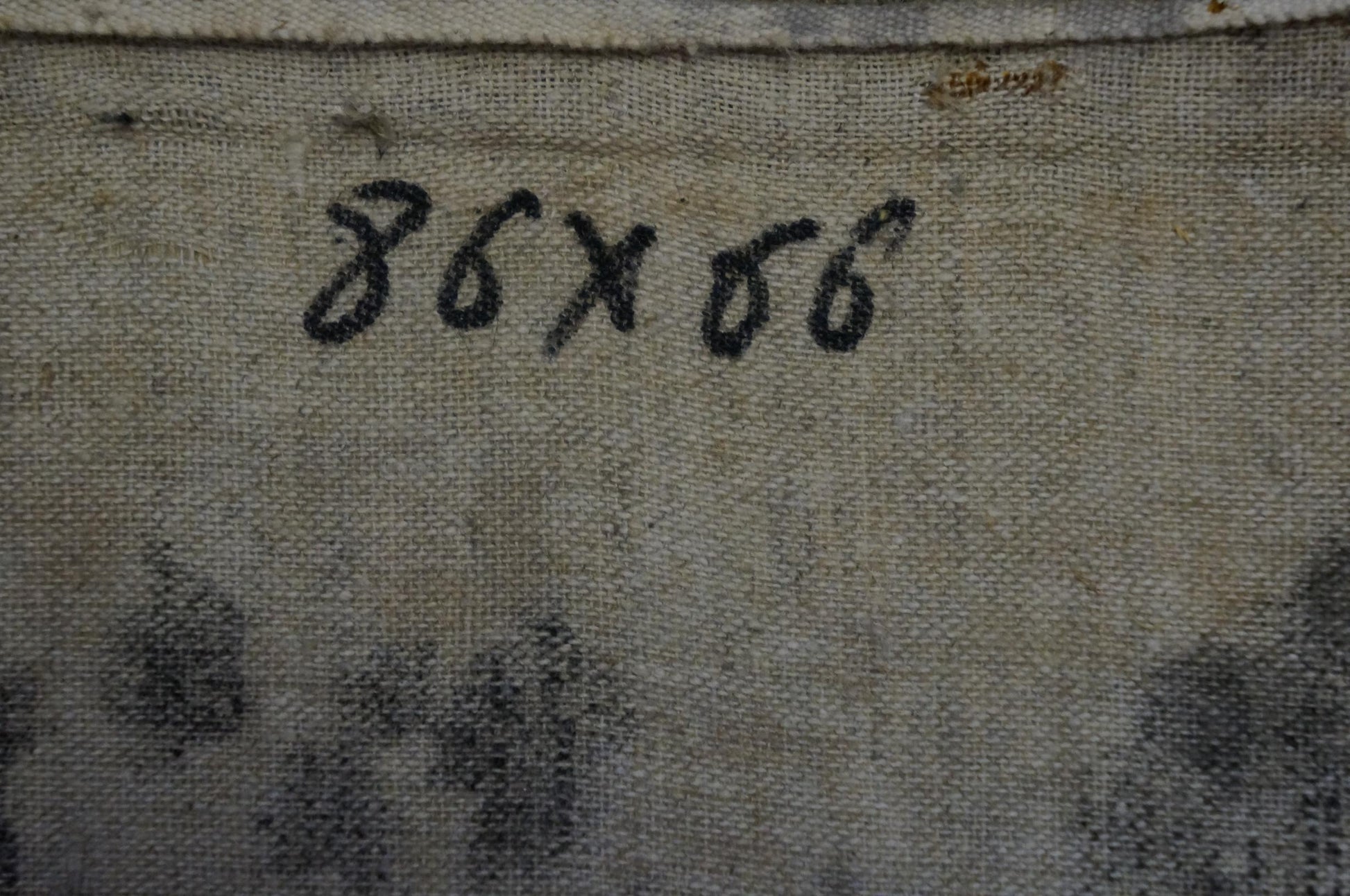Back of Odarka Anatoliivna Tytarenko Sunflowers oil painting, worn beige canvas 86x56